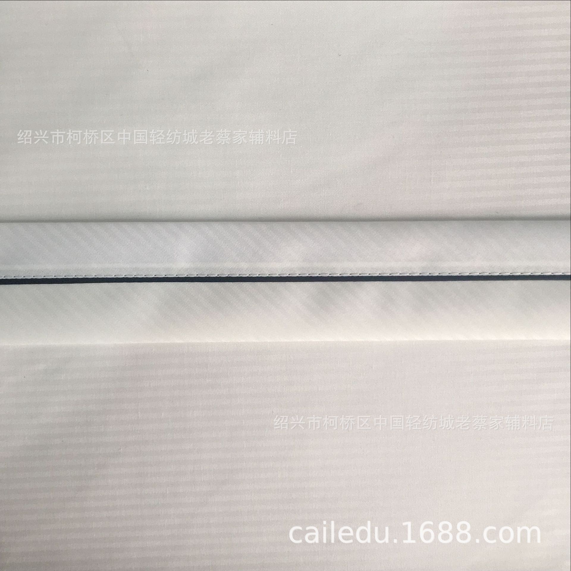 奶白色鱼骨纹黑嵌条腰里