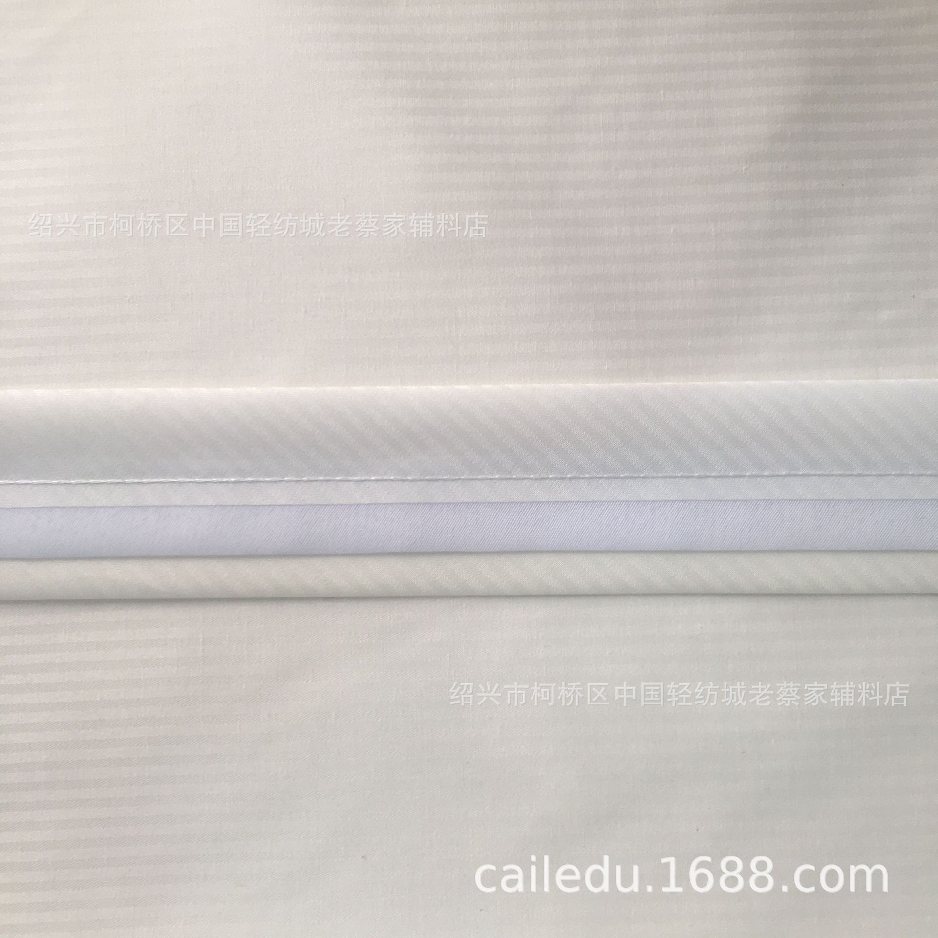 奶白色鱼骨纹黑嵌条腰里